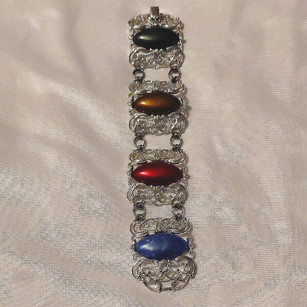 Sarah Coventry Silver Bracelet with Red, Blue, Black, and Gold Accents